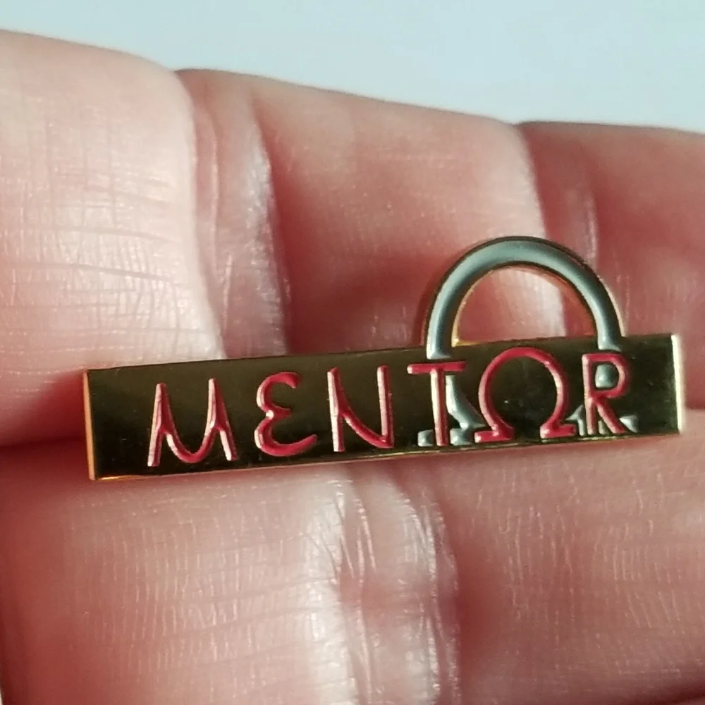 Mentor lapel pin Omega red enamel gold tone metal Greek symbol brooch